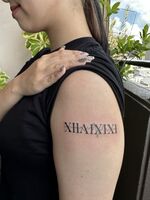 腕tattoo　ローマ数字